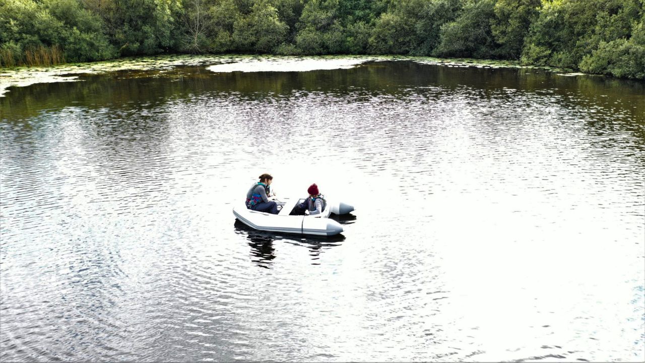 Scientists sampling protists from a boat